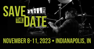 Save the date image for the Percussive Art Society International Convention happening November 8 through 11, 2023, in Indianapolis Indiana. Image features 2022 performer Pedrito Martinez.